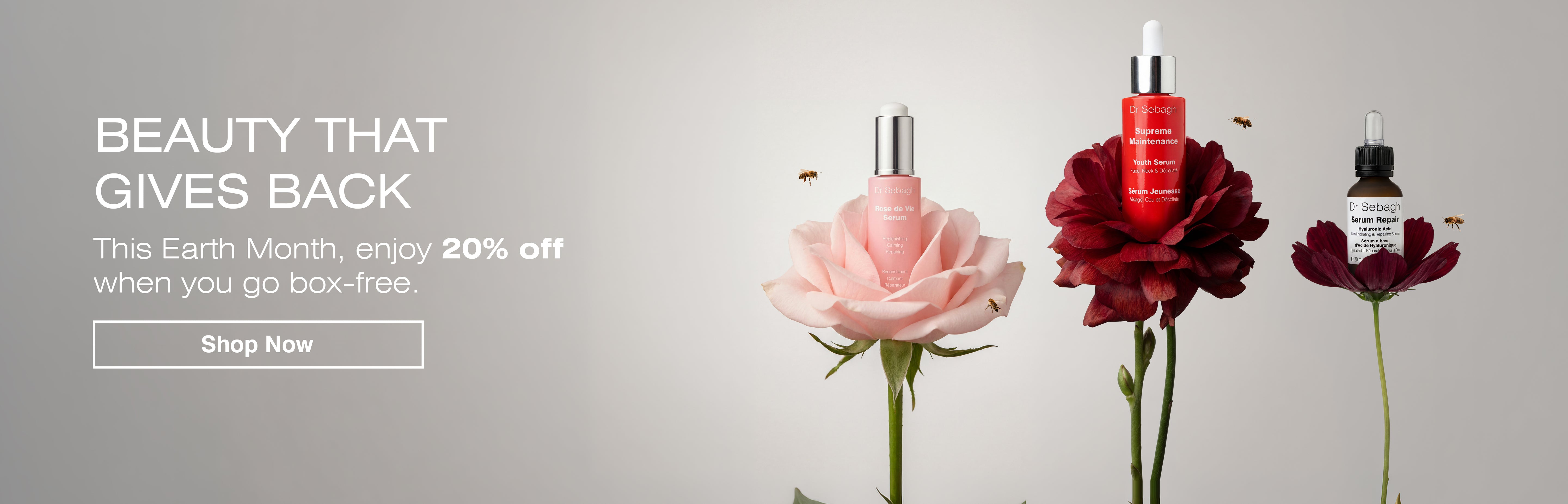 Earth Month skincare banner featuring Dr Sebagh serums displayed within blooming flowers, promoting 20% discount for box-free sustainable beauty with “Shop Now” call to action.