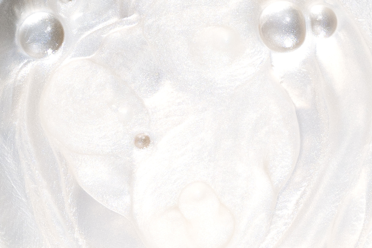 Close-up of white mother of pearl with iridescent surface