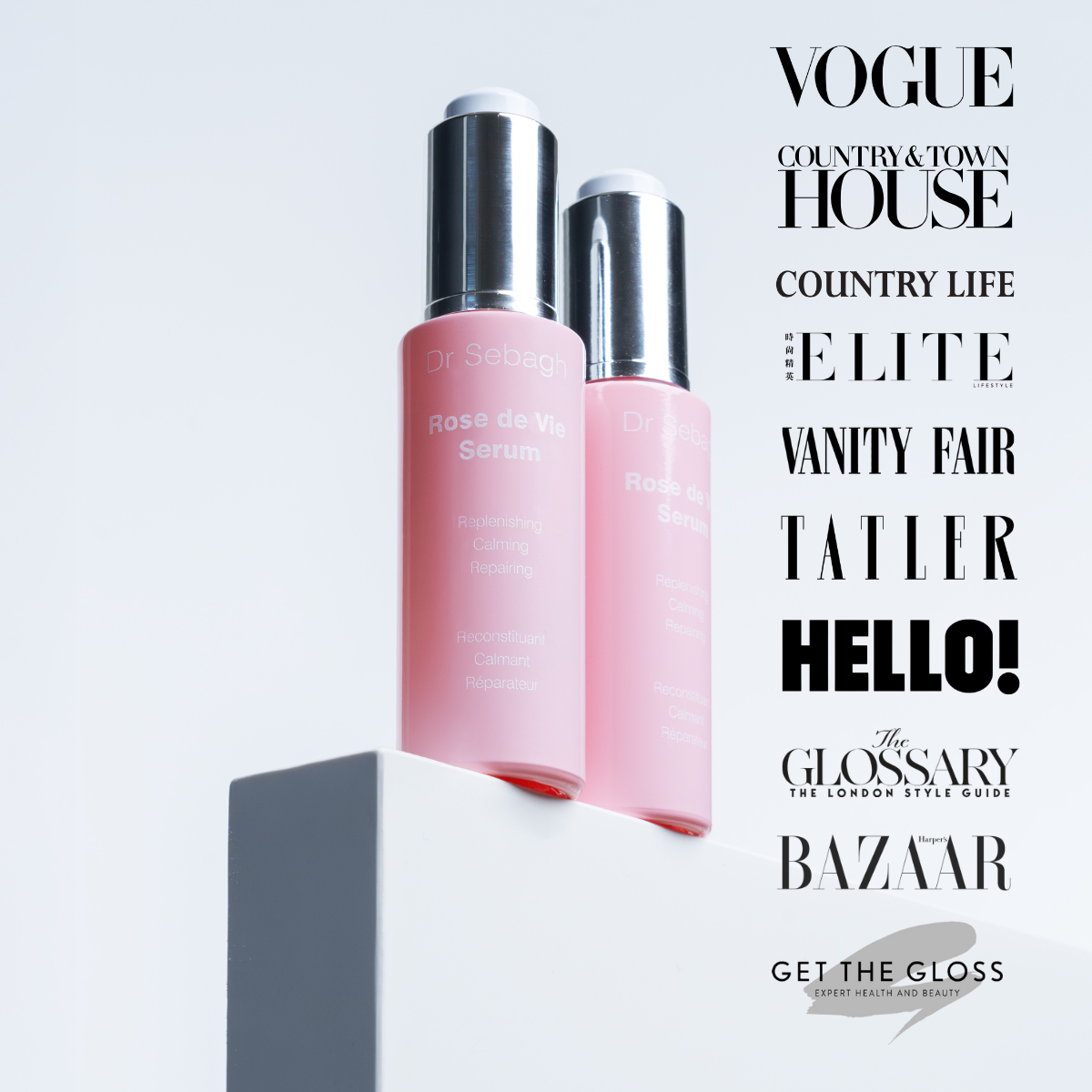 Two Dr Sebagh Rose de Vie serum bottles with silver caps on a white background, featuring press magazine titles.