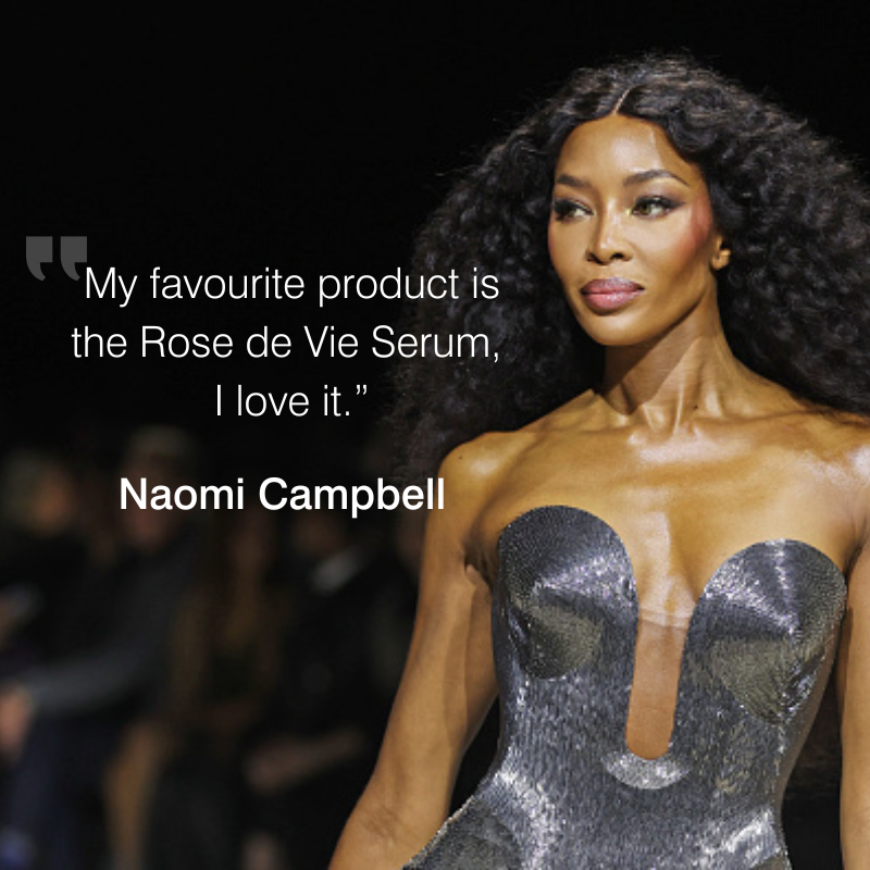 Naomi Campbell on runway with overlaid quote about Dr Sebagh Rose de Vie Serum on a promotional graphic.”