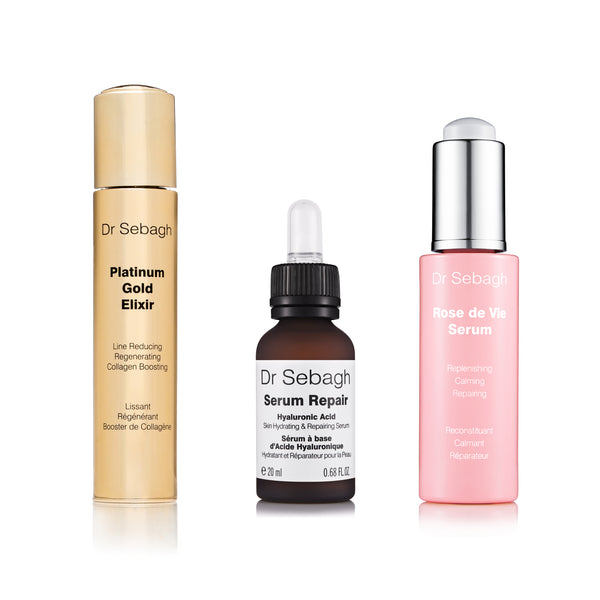 Absolute Firming Serum Blend - Luxury anti-aging trio featuring Platinum Gold Elixir, Serum Repair, and Rose de Vie Serum in premium bottles