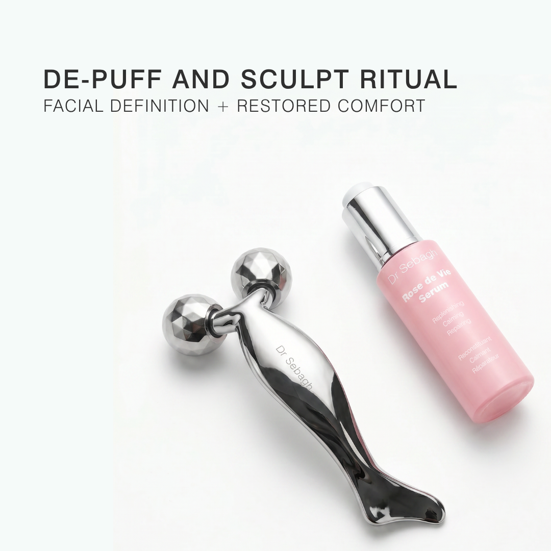 Facial roller and pink bottle with text 'De-Puff and Sculpt Ritual' on a white background