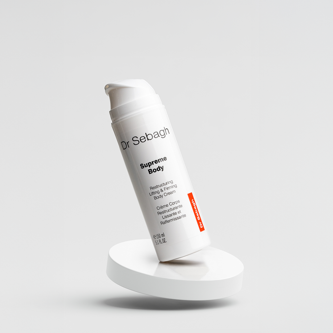 Dr Sebagh Supreme Body moisturising lifting and firming body cream bottle balanced on white pedistal