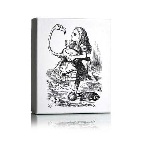Dr Sebagh Christmas gift box with a white lid printed with Tenniel's illustration of Alice holding a flamingo