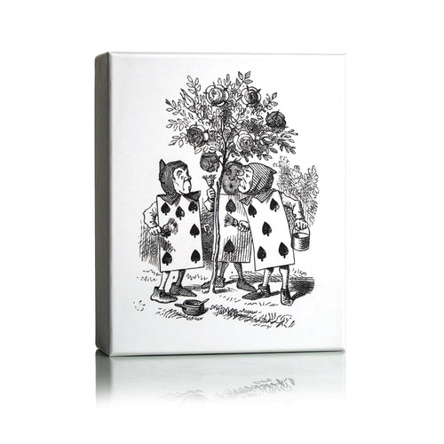Dr Sebagh Christmas gift box with a white lid printed with Tenniel's illustration of the playing card gardeners painting the roses beside a rose tree