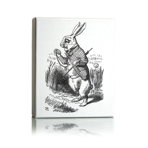 Dr Sebagh Christmas gift box with a white lid printed with Tenniel's illustration of the White Rabbit in a checked waistcoat consulting his pocket watch