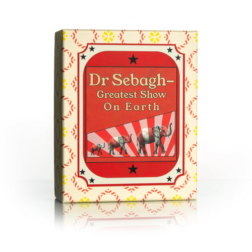 Dr Sebagh Christmas gift box printed with a red vintage circus poster reading Dr Sebagh Greatest Show On Earth, with three elephants