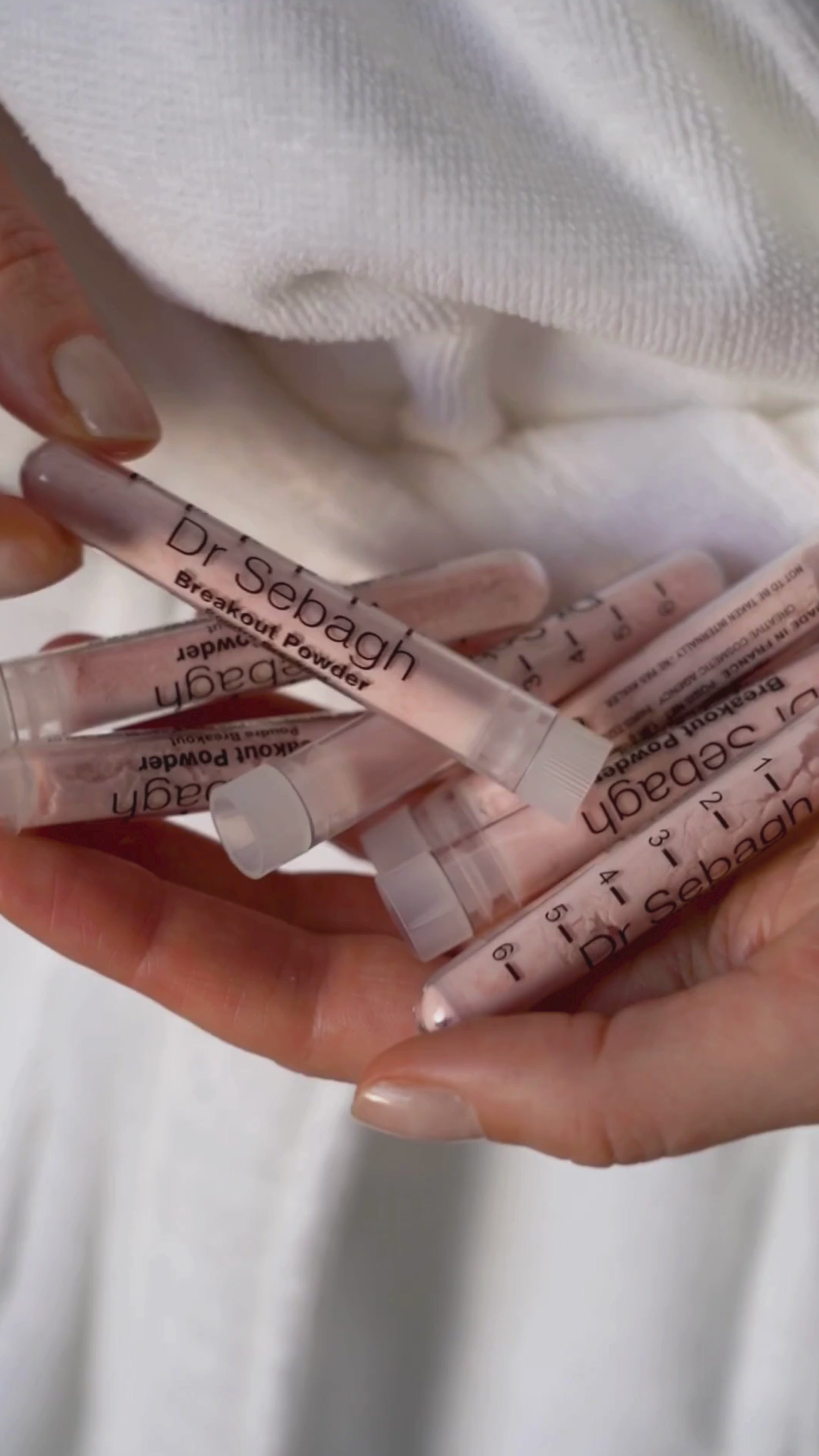 Dr Sebagh explaining what Breakout Powder is and how its key ingredients help target breakouts, excess oil and blemish-prone skin